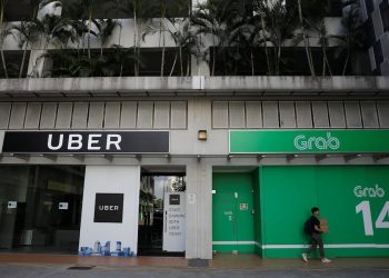 Grab เข้าซื้อกิจการ Uber ในเอเชียตะวันออกเฉียงใต้